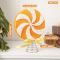 Christmas orange swirl lollipop tree topper with spring base and yellow ribbon bow - Ginger Yellow Windmill Tree Top Star (EJ0272S-Ginger Yellow)