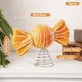 Festive orange candy Christmas tree topper ornament with dimensions and spring base. - Candy Tree Top Star (EJ0272S-Candy)