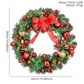 Ghirlanda di Natale artificiale da 50 cm con ornamenti rossi, fiocco e schiaccianoci - Ghirlanda Schiaccianoci con Fiocco (XM-0027)