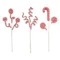 Detailed view of red and white striped plush Christmas peppermint candy stems - Three-Piece Set / Red