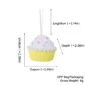 Yellow macaron cupcake Christmas tree ornament with glitter details and size info. - Cupcake / Light Yellow