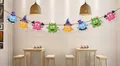 Colorful cartoon monster banner decoration hanging in a cozy cafe for Halloween party - Colorful Monster Style (WAZ2)