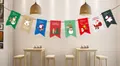 Detailed view of colorful Christmas cartoon flag banner hanging in a cozy indoor setting - Square Flag B-3
