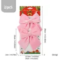 Two-pack pink velvet Christmas bow tie decorations with size and weight measurement details - 2 Pieces/Pack (14*15cm) / Light Pink