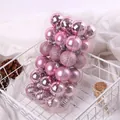 Close-up view of 36 mixed-texture pink Christmas ball ornaments displayed in a white wire basket - 4cm / Set of 36 / Pink