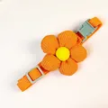 Orange adjustable pet collar featuring a large corduroy flower for small dogs and cats - Orange