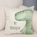 Cartoon green dinosaur decorative throw pillow cover with 'BE UNIQUE' text on a sofa - Linen Double-Sided (BZ15-4) / 45x45cm / Dinosaur