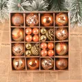 A premium set of 42 copper and gold Christmas ball ornaments displayed in a storage box - 42 Pieces/Pack / Bronze