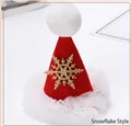 Mini red Christmas hat hair clip featuring a golden snowflake ornament and white lace trim. - Lace Snowflake Hat