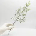 Detailed macro view of a frosted PE pine needle branch for DIY Christmas wreaths - Small Leaf Pine Branch Snowy (SZ08)