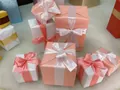 Assorted pink and white decorative Christmas gift boxes with elegant silk satin ribbons - Set of 7 Figures / Pink Box