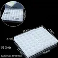 Vue détaillée montrant les dimensions de la boîte de rangement en plastique à 56 grilles - 56 Compartiments / 21.1x17.5x2.7cm