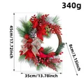 Detailed view of 45cm Christmas wreath with pine needles, red berries, and a cardinal. - Cardinal Wall Hanging Wreath Style (Cardinal Wall Hanging Wreath-SH)