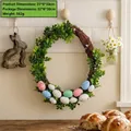 Handcrafted Easter wreath featuring green boxwood leaves and colorful speckled eggs - Easter Egg Wreath