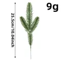 Artificial green pine needle branch for Christmas decoration, 10.04 inches long, 9g weight. - Three-Head Green Branch