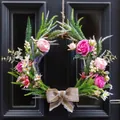 Decorative artificial floral wreath with pink roses and burlap bow on a black door - Wreath (J2-44)