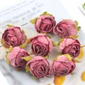 Detailed macro view of vintage dusty pink silk rose buds for DIY crafts and wedding decor - Retro Copper