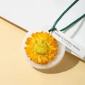 Scented candle wax tablet with yellow dried flower and green ribbon - Gardenia