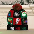 Festive LED lighted Christmas knitted beanie hat with colorful icons and Ho Ho Ho text - Black Grid