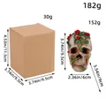 Halloween resin skull ornament with red roses and size specifications in inches/cm - Vine Style