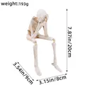Gothic Halloween resin skeleton figurine in see-no-evil pose for spooky table decor - See No Evil Skeleton (K2-15)