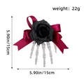 Halloween skeleton hand hair clip featuring a black rose and burgundy bow, 15cm size - One Size / Black Rose Style