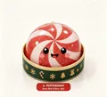 Close-up of peppermint rosy red glitter jelly squishy toy in festive Christmas gift box set - Rosy Red Spiral Glitter Style / Candy Cane