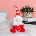 Valentine's Day faceless gnome doll holding a red plush heart with LOVE embroidery - Heart-Holding Male Style