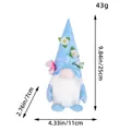 Blue floral faceless gnome plush doll shown with dimensions 25x11x7cm and weight 43g - Blue