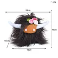 Plush Scottish Highland cow doll with floral decor and size dimensions shown in cm - 15cm / Black