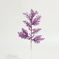 Macro detail of a purple glitter artificial pine needle branch for Christmas DIY crafts - Purple Pine Needle