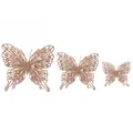 Set aus drei roségoldenen hohlen Glitzerschmetterlingen für die weihnachtliche Festdekoration - Champagner