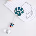 Close-up of paw print suncatcher with colorful crystals and a large faceted glass ball - Colorful Paw Print