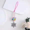 Detail of Christmas bell pendant with colorful mini bells and silver snowflake charm - Red Green Snowflake