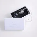 Detailed macro shot of the crystal lotus sun catcher inside its white gift box - Flower Design Ornament (With Gift Box) / Clear Crystal