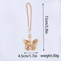 Detailed view of champagne crystal butterfly suncatcher with measurements and weight - 15cm / Champagne Butterfly