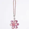 Macro detail of a pink faceted crystal flower suncatcher showing prismatic light effects - Crystal Flower Pendant / Pink