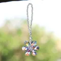 Detail of colorful crystal flower suncatcher prism showing iridescent rainbow effect - Crystal Flower Pendant / Phantom Purple