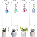 Close-up detail of 4 iridescent crystal suncatchers showing application in potted plants - 4 Pieces / Silver