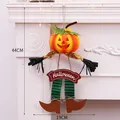 Whimsical Halloween pumpkin hanging decoration with striped legs and wooden sign - Green Pants Style (CH343 Green Pants) / Green