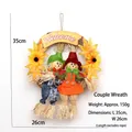 Ghirlanda decorativa da appendere per Halloween con coppia di spaventapasseri e fiori - Ghirlanda Spaventapasseri Coppia