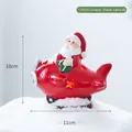 Statuina Babbo Natale in ceramica su aereo rosso decorazione natalizia 10x11cm - Aereo Babbo Natale Stile B (T23015) / 10x11cm