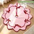 90cm pink plush Christmas tree skirt with wavy edges and decorative red velvet bows - 90cm / Pink