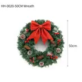 Couronne de Noël décorative de 50 cm avec nœud rouge pailleté et pommes de pin - Couronne de Noël / 50cm
