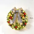 Pre-lit 40cm Christmas wreath with festive ornaments and black white checkered bow - With Lights / 40CM Wreath