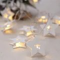 White wooden star string lights with warm LED glow for cozy Christmas indoor decor. - Five-pointed Star