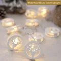 Warm white LED string lights with white wooden reindeer head silhouettes for decor - Round Reindeer Head Style