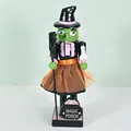 Wooden Halloween witch nutcracker decoration with orange mesh skirt and magic broom - Witch / 25cm