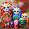 Detailed view of colorful hand-painted wooden Russian nesting dolls in various sizes - 10-Layer Sunflower Style / 21cm High / Colorful