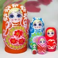 Traditionelles handbemaltes Matroschka-Set mit fünf bunten floralen Holzpuppen - 5-Schichten Orange Sonnenblume-Stil